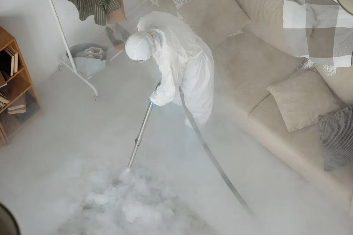 Biohazard cleanup technician in protective equipment, MacArthur, WV